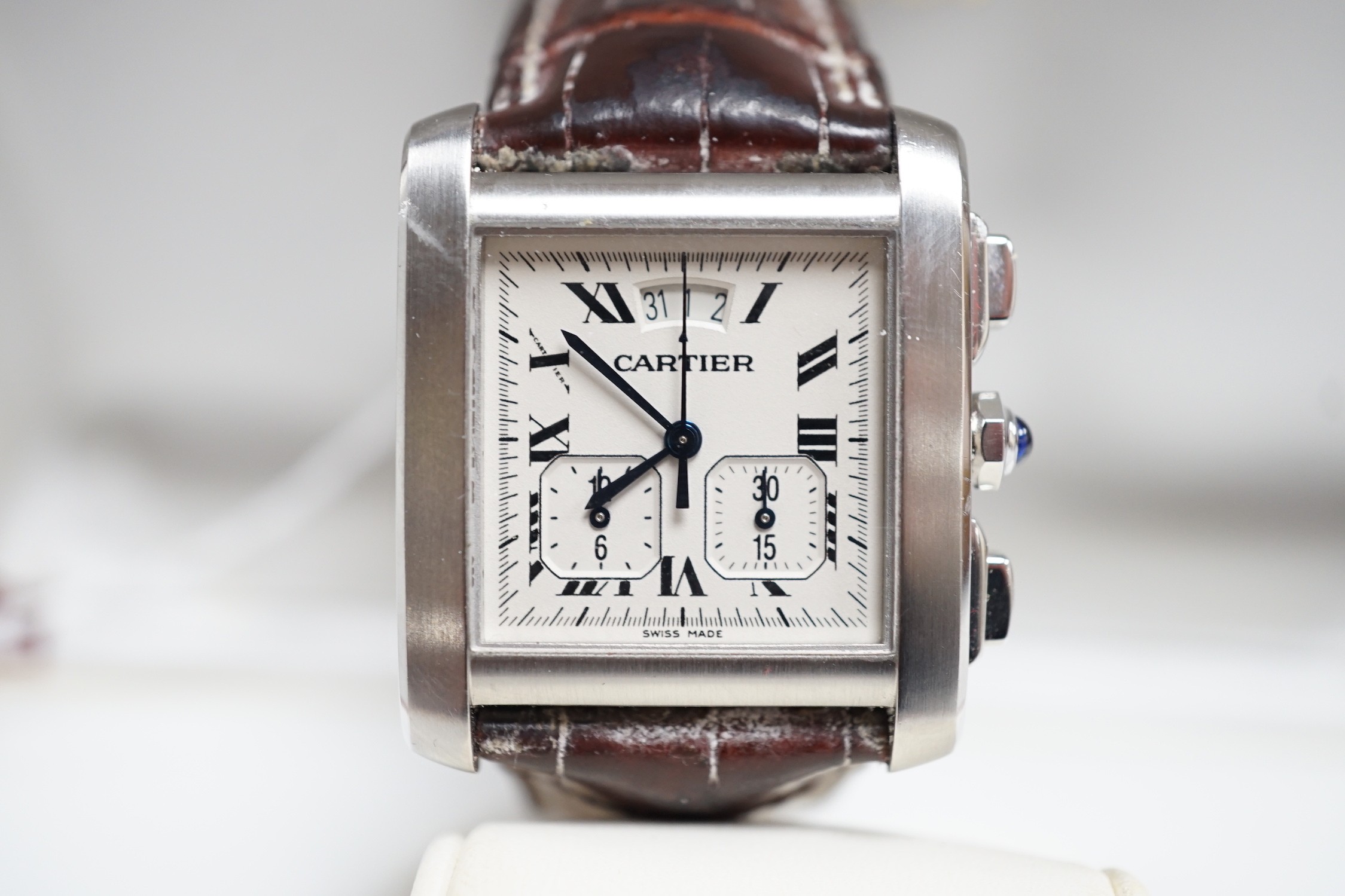 A gentleman's 2006 stainless steel Cartier Tank Francaise quartz wrist watch, with Roman numerals and two subsidiary dials, case diameter 30mm, with original Cartier box and booklets.
